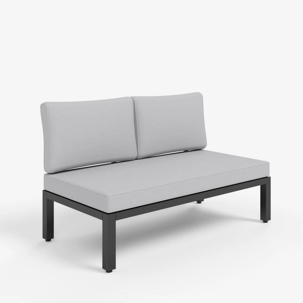 2-seater garden sofa with thick cushions in a classic backyard setting